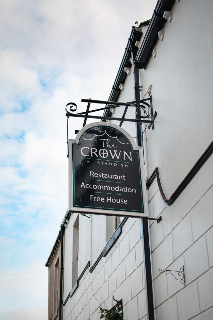 the crown at worthington sign